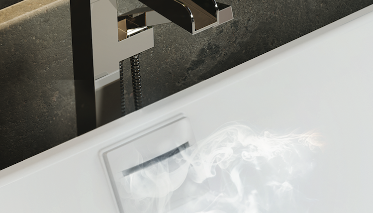 AromaCloud mist rising near a BainUltra bath.